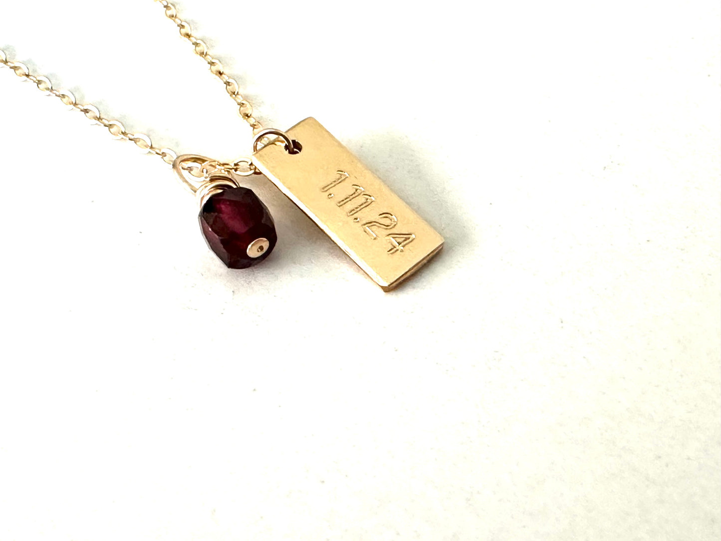 date tag necklace