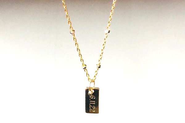 date tag necklace
